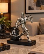 StrengthBound Muscle Man Pulling Chain Sculpture – view 2
